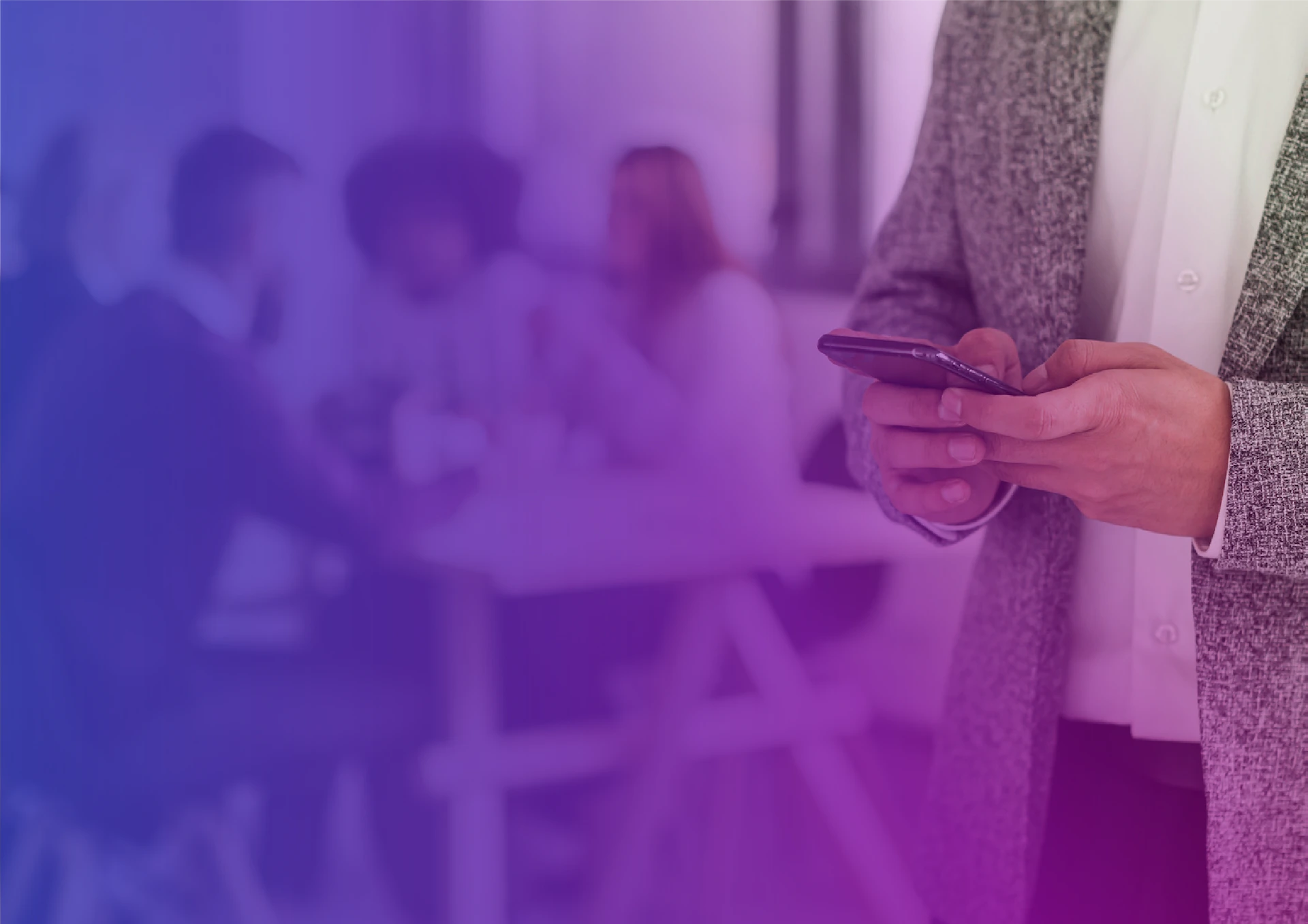 person standing playing on their phone