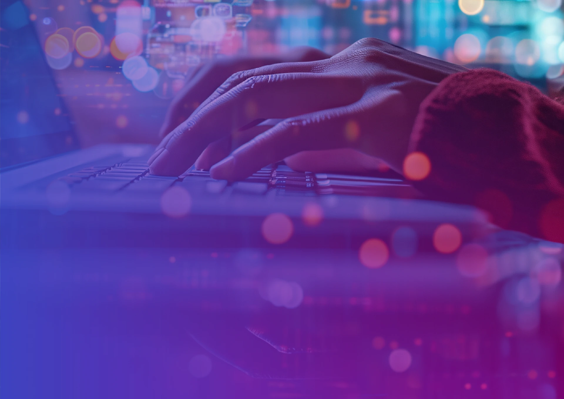 person typing on a laptop